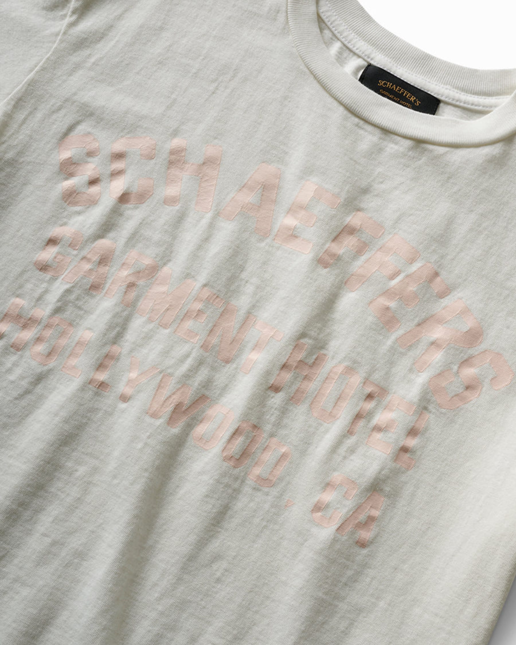 Schaeffer's Garment Hotel Cycle Varsity Tee Pink Cracked Print